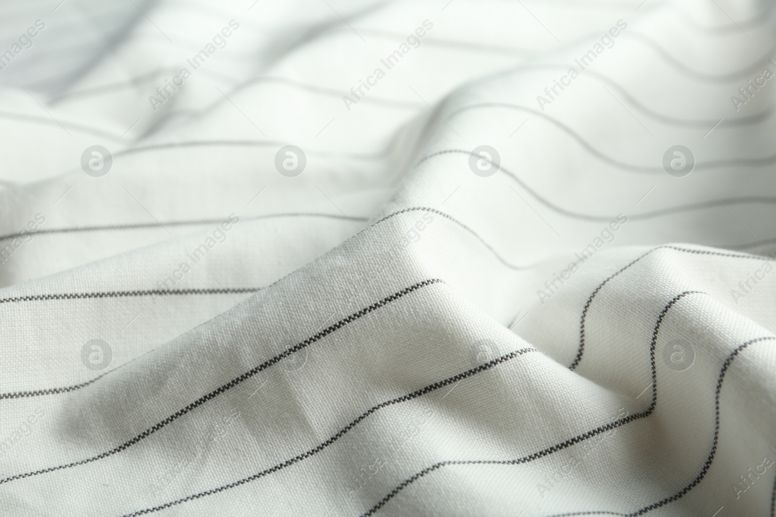 Photo of Texture of white striped fabric as background, closeup