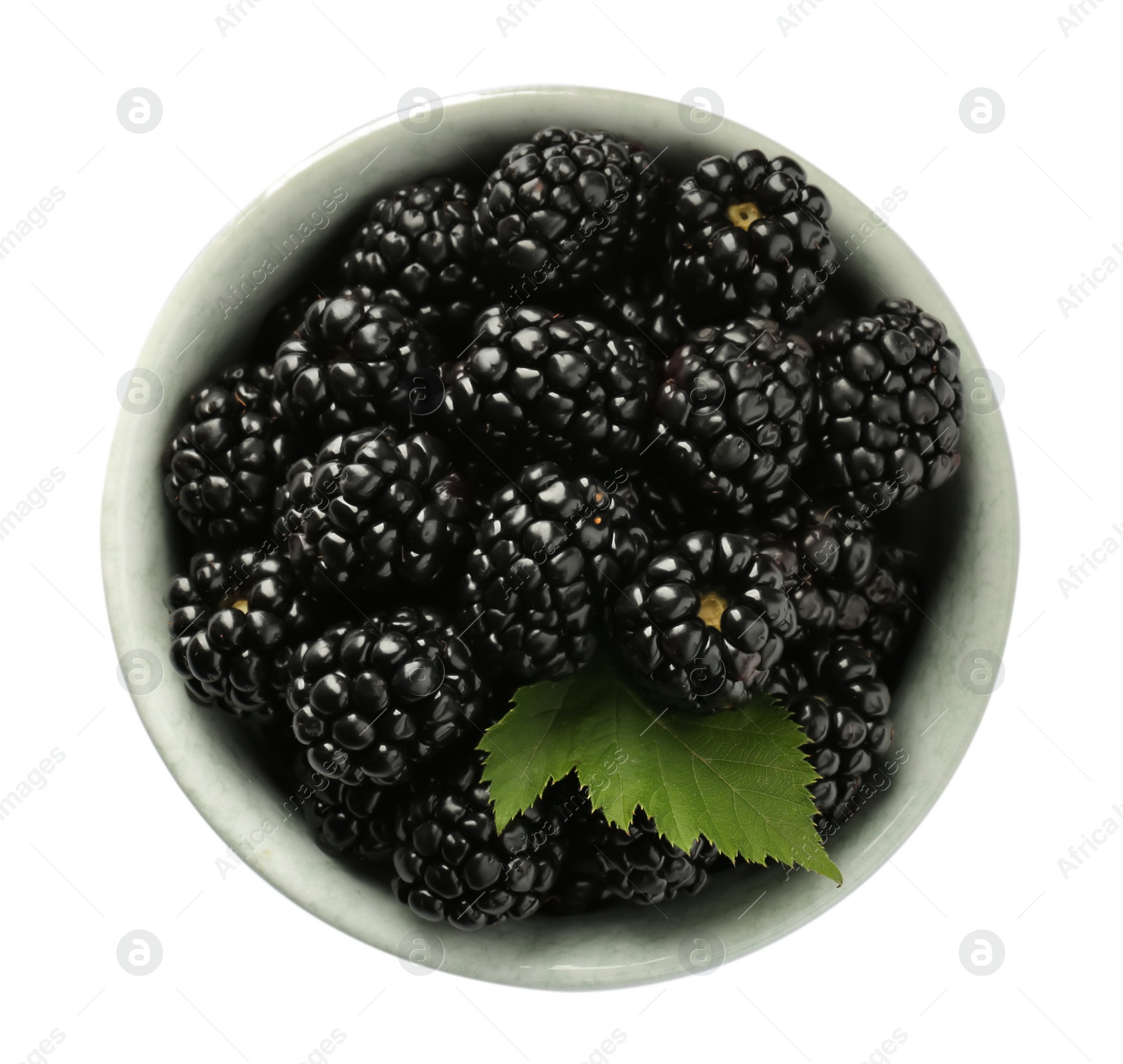 Photo of Bowl with fresh ripe blackberries isolated on white, top view