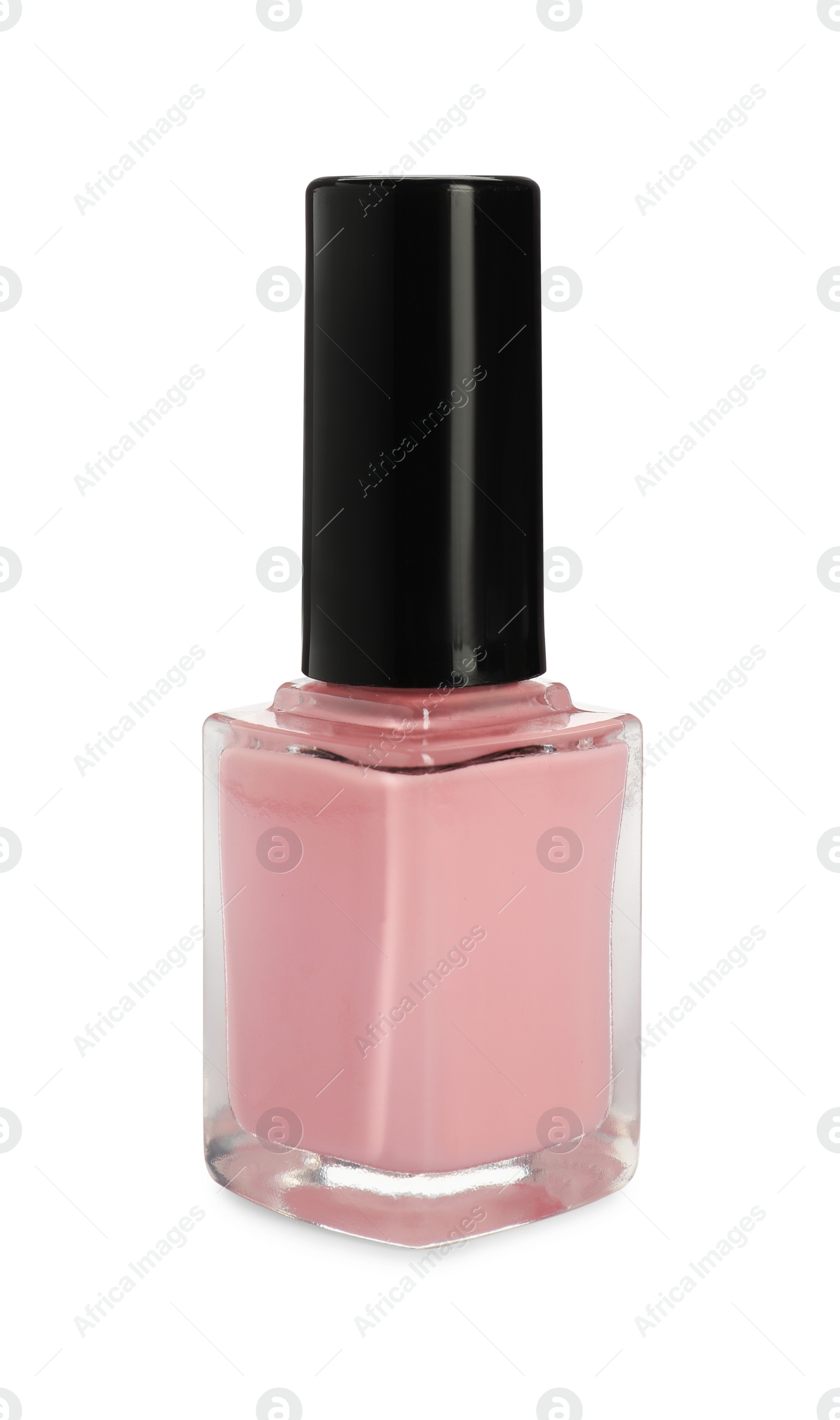Photo of Pink nail polish in bottle isolated on white