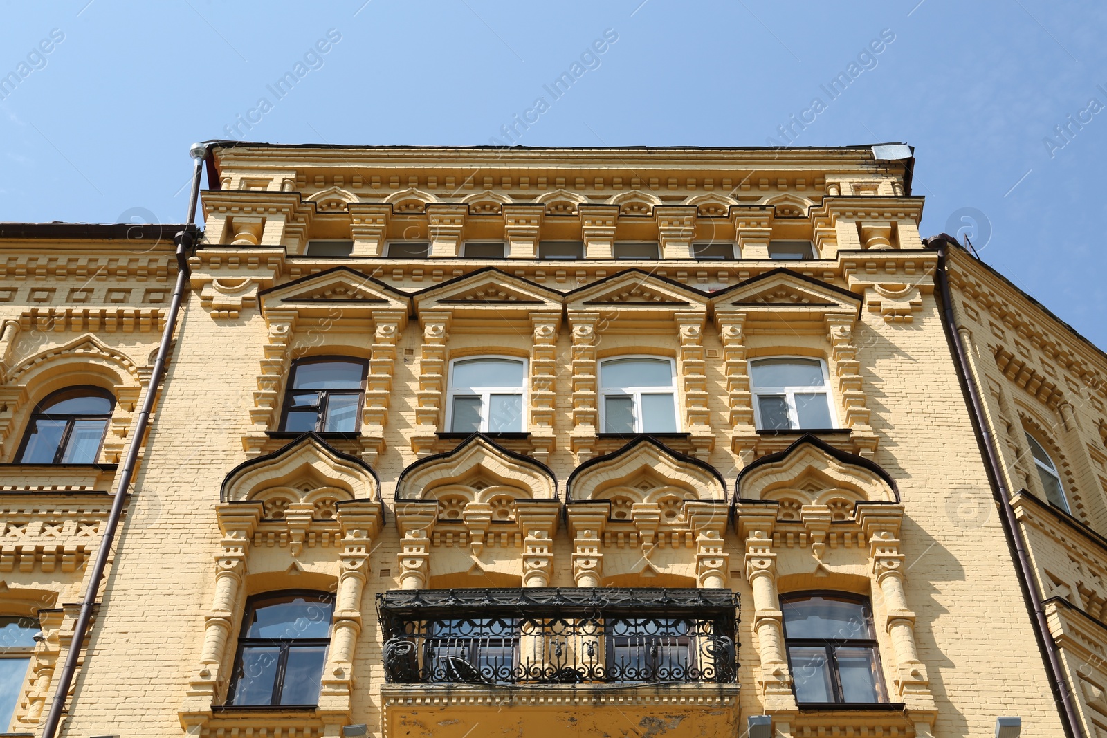 Photo of Beautiful facade of building on sunny day, low angle view