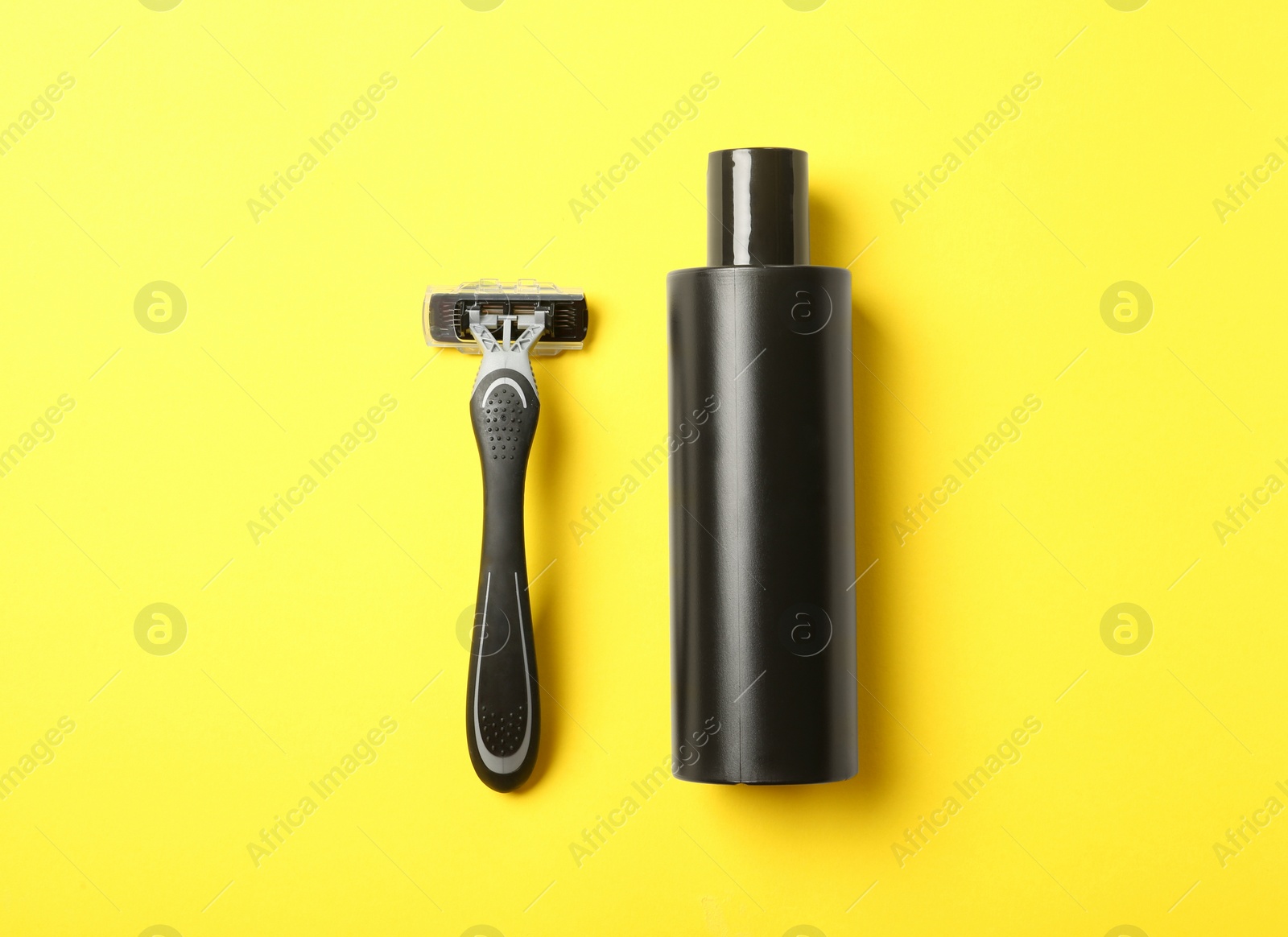 Photo of Flat lay composition with men's shaving accessories on color background