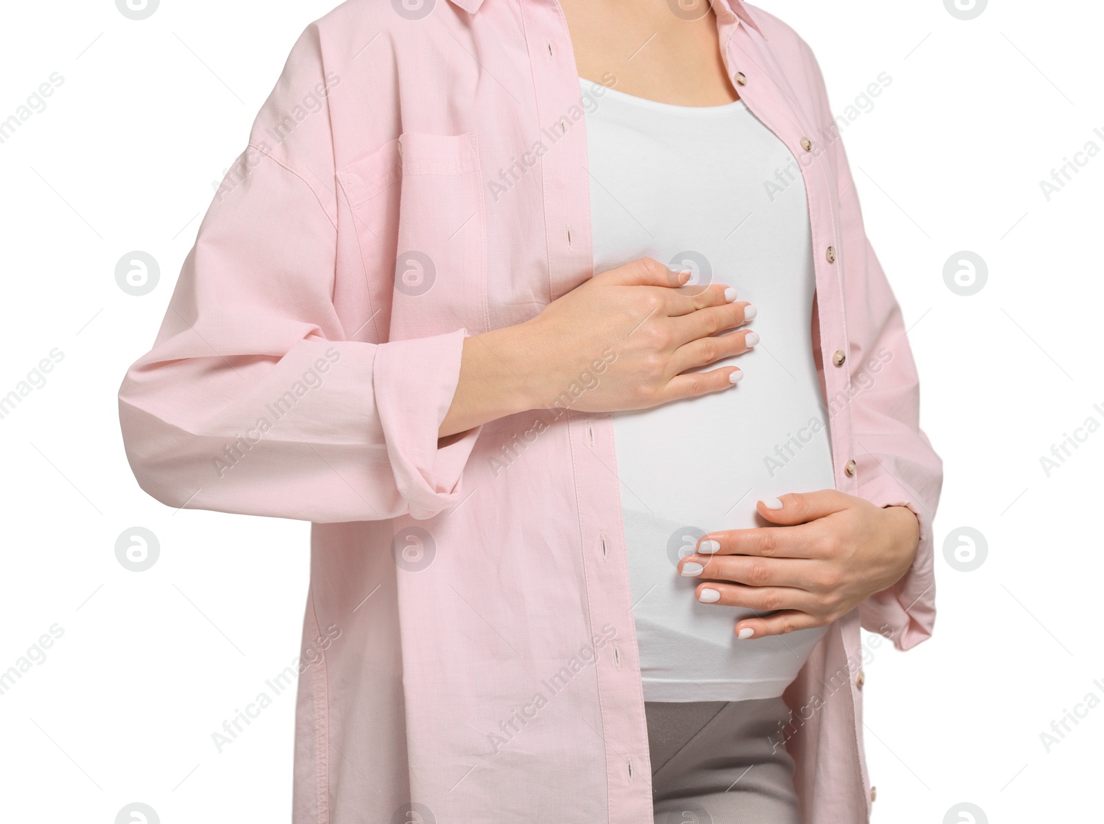 Photo of Pregnant woman touching her belly on white background, closeup