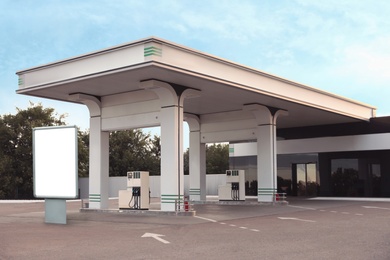 Image of Empty billboard on modern gas station outdoors, space for design