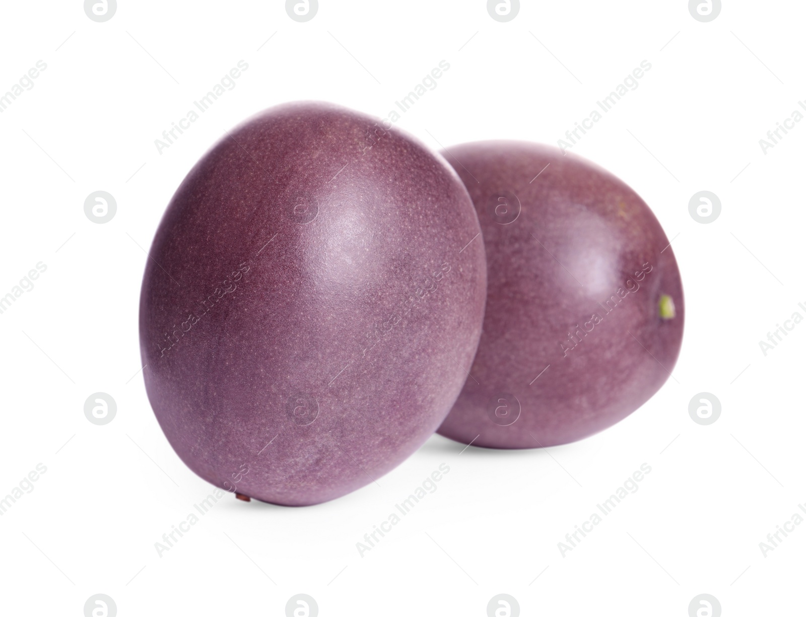 Photo of Delicious ripe passion fruits on white background