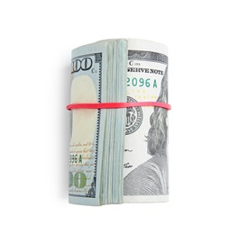 Roll of dollar bills with rubber band on white background, top view