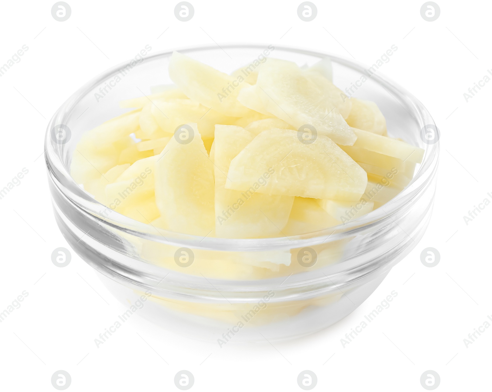 Photo of Pieces of raw carrot in glass bowl isolated on white