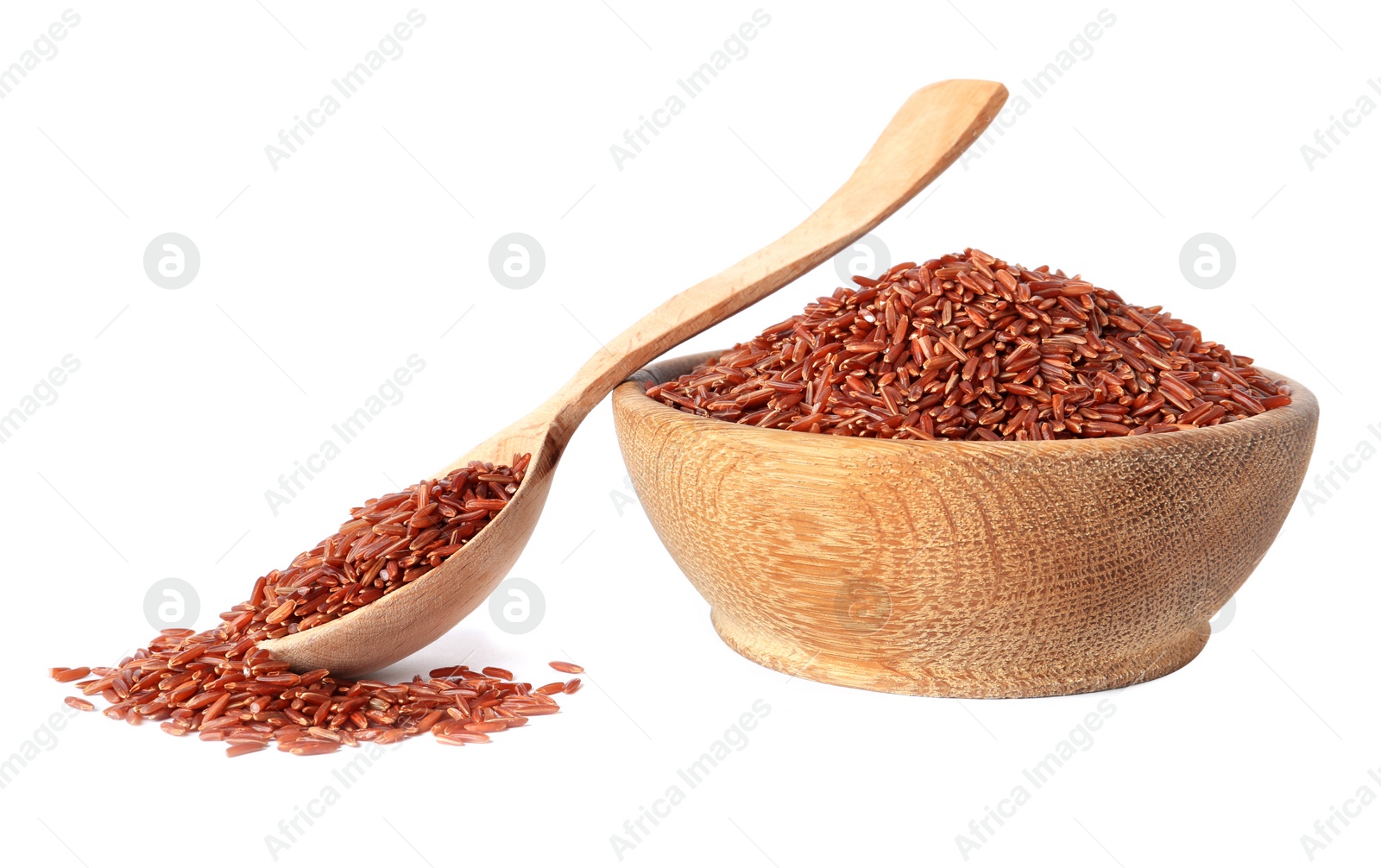 Photo of Bowl and spoon with uncooked brown rice on white background