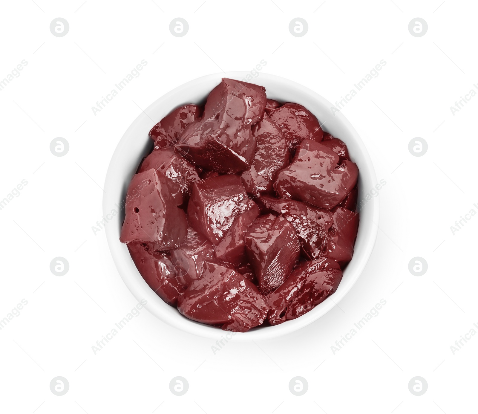 Photo of Cut raw beef liver in bowl isolated on white, top view
