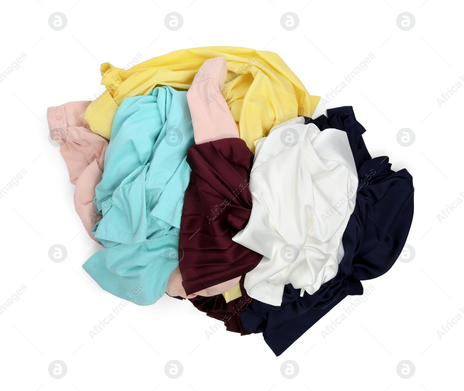 Pile of clothes isolated on white, top view Photo of Pile of clothes isolated on white, top view