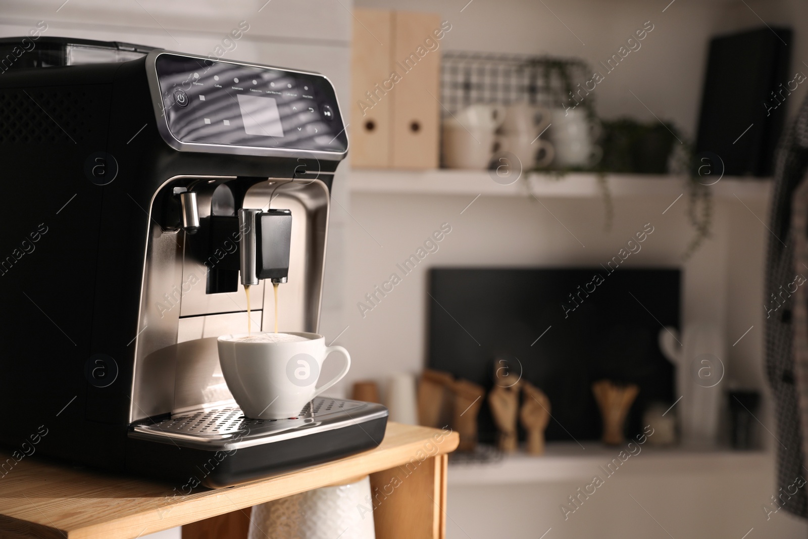 Photo of Modern coffee machine making tasty drink in office kitchen, space for text