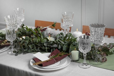 Stylish elegant table setting for festive dinner indoors