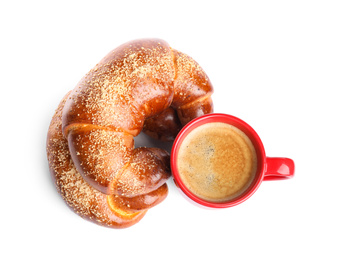 Delicious pastries and coffee on white background, top view