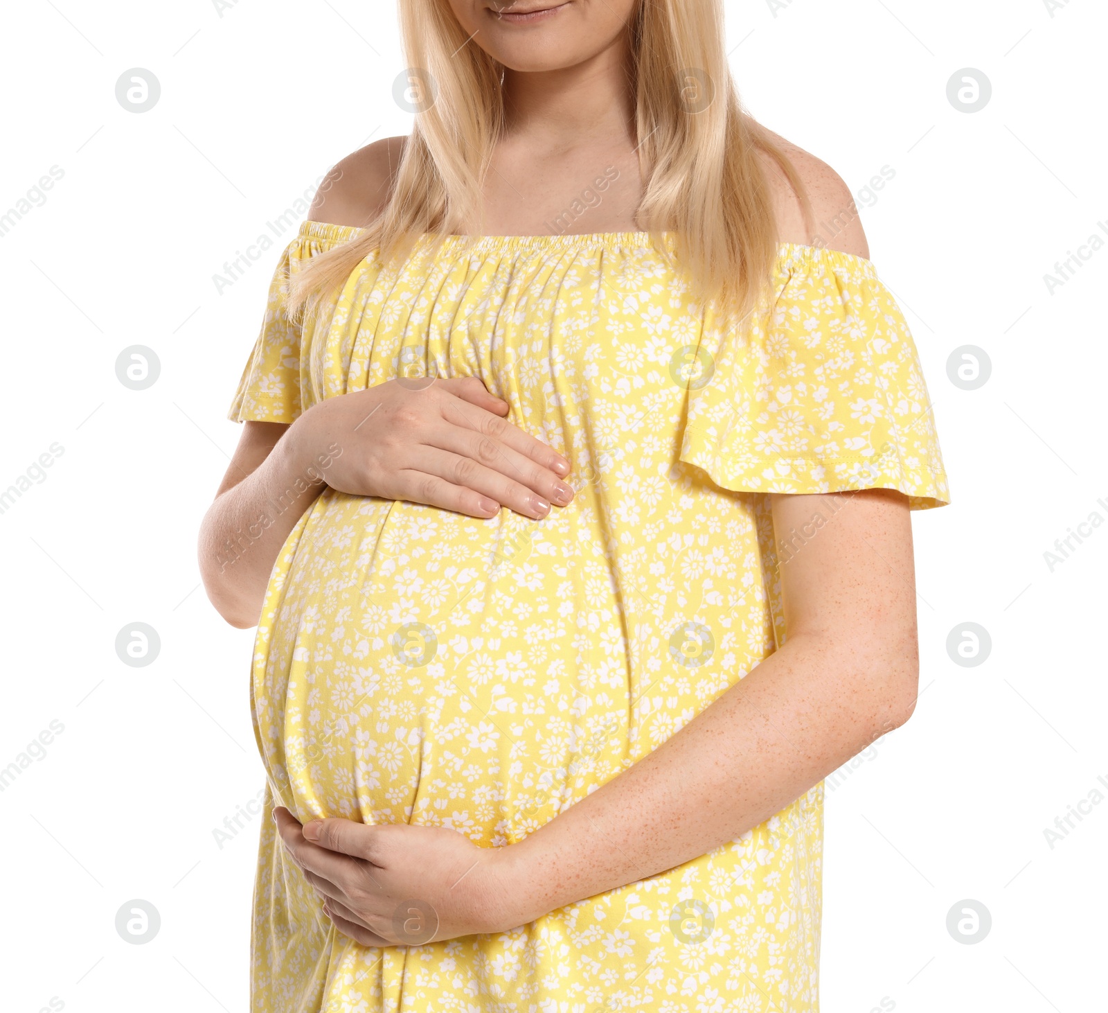 Photo of Pregnant woman in dress on white background