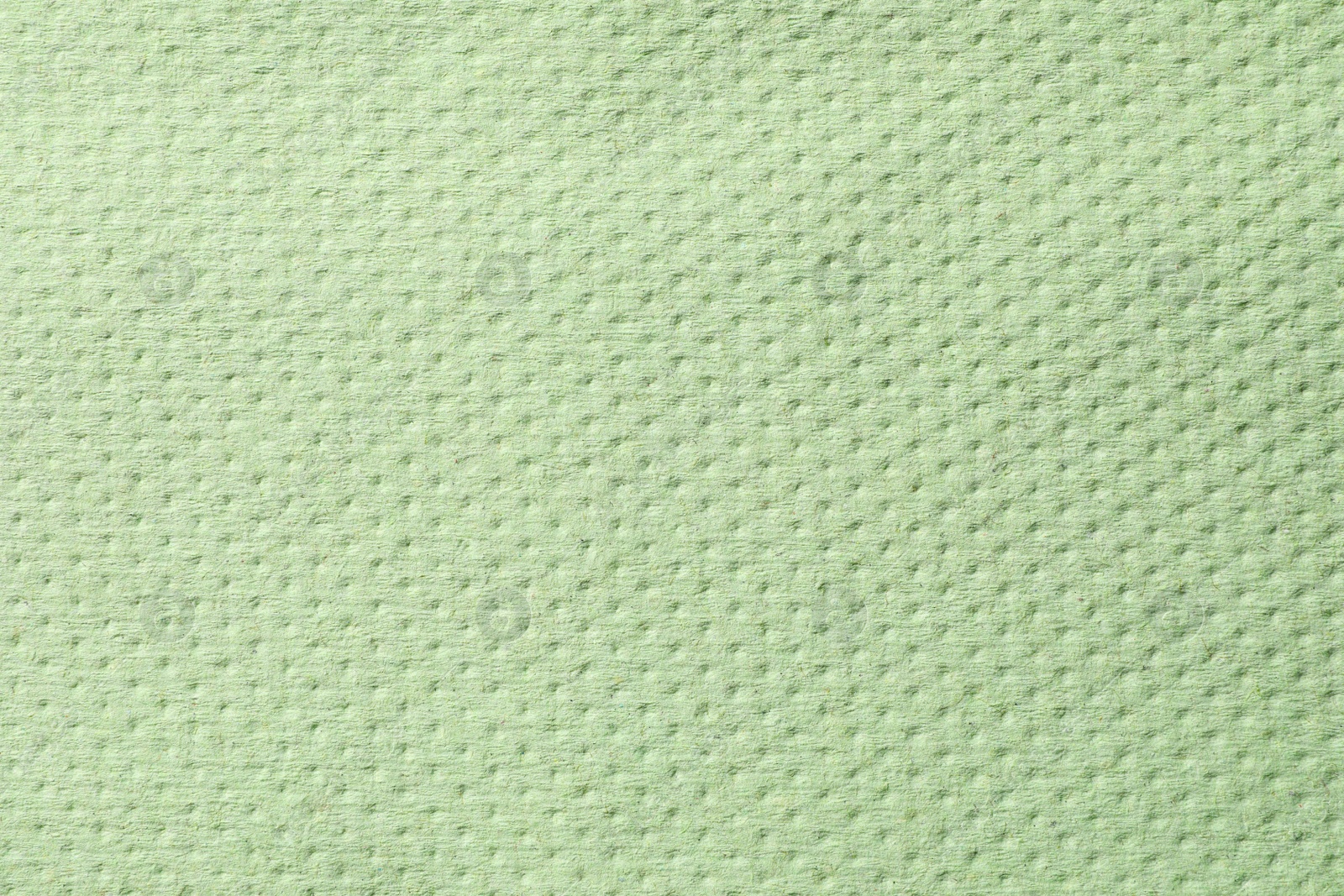 Photo of Texture of paper towel as background, closeup view