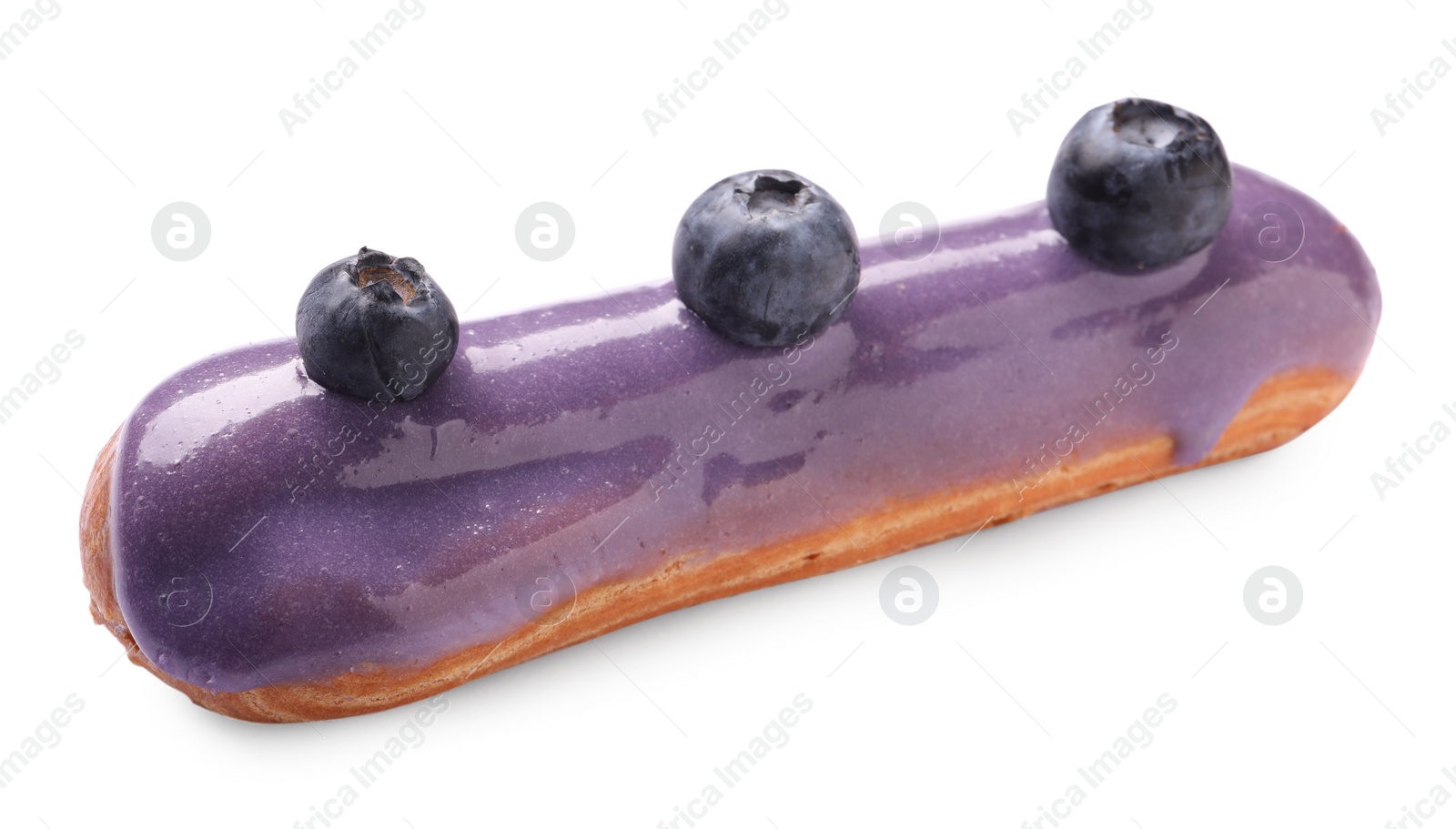 Photo of Delicious eclair decorated with blueberries isolated on white