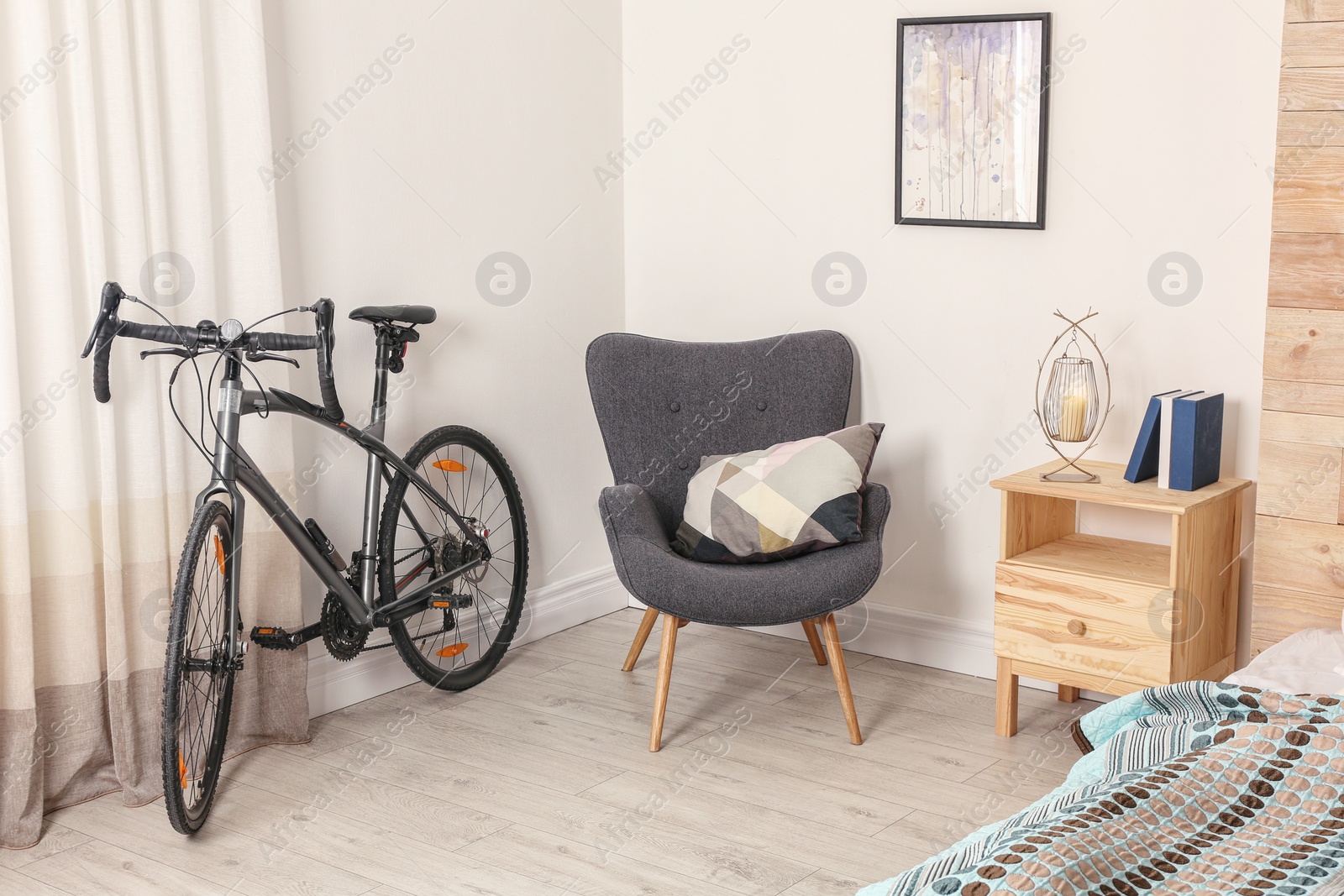 Photo of Modern apartment interior with bicycle near window