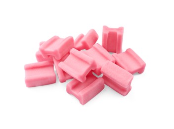 Photo of Pile of tasty pink chewing gums on white background