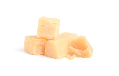 Pieces of delicious parmesan cheese on white background