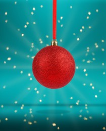 Image of Beautiful red Christmas ball hanging on color background