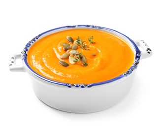 Image of Tasty creamy pumpkin soup in bowl on white background