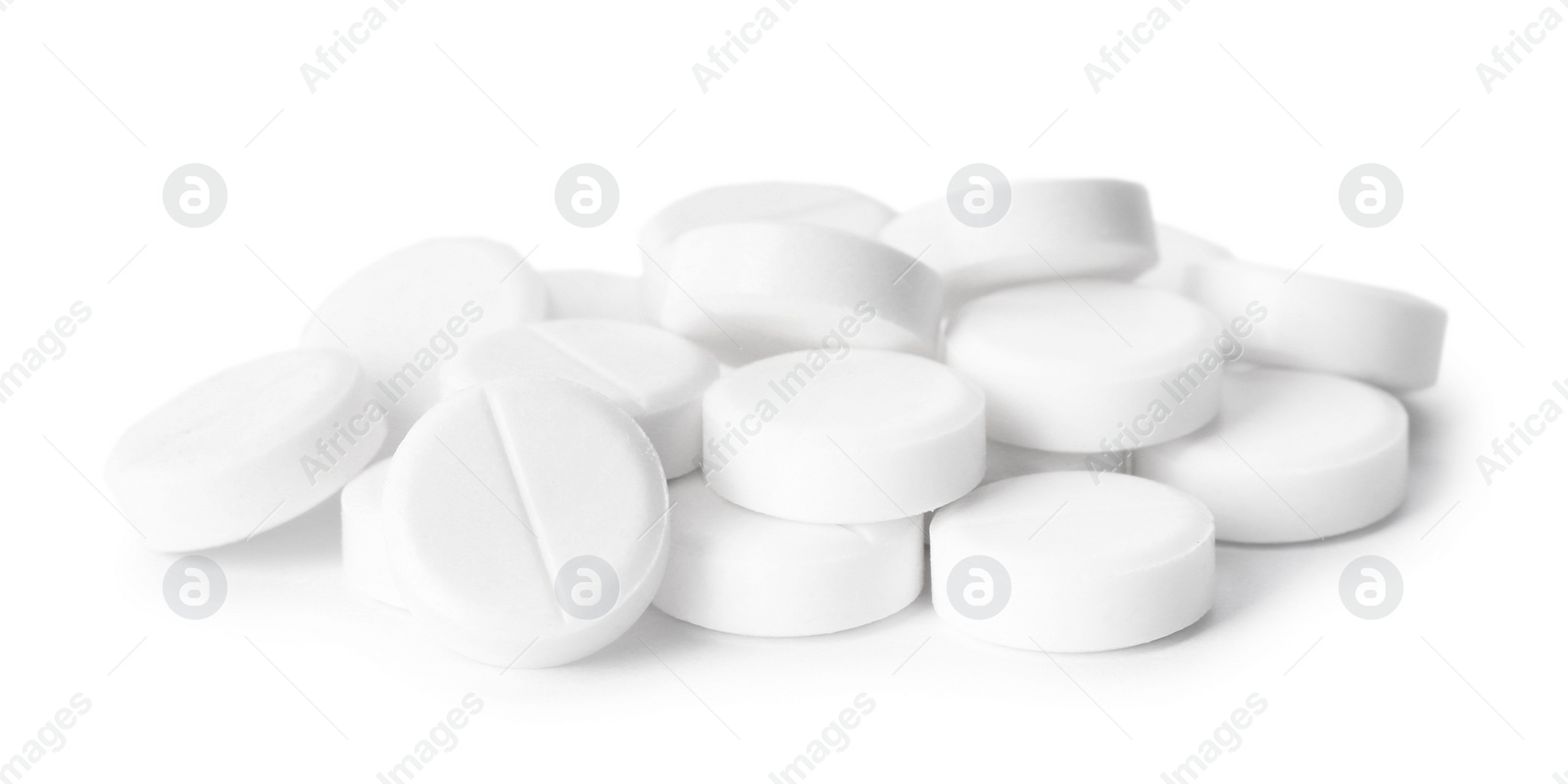 Photo of Pile of pills on white background. Medical treatment