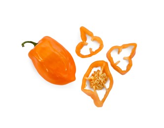 Photo of Whole and cut orange hot chili peppers on white background, flat lay