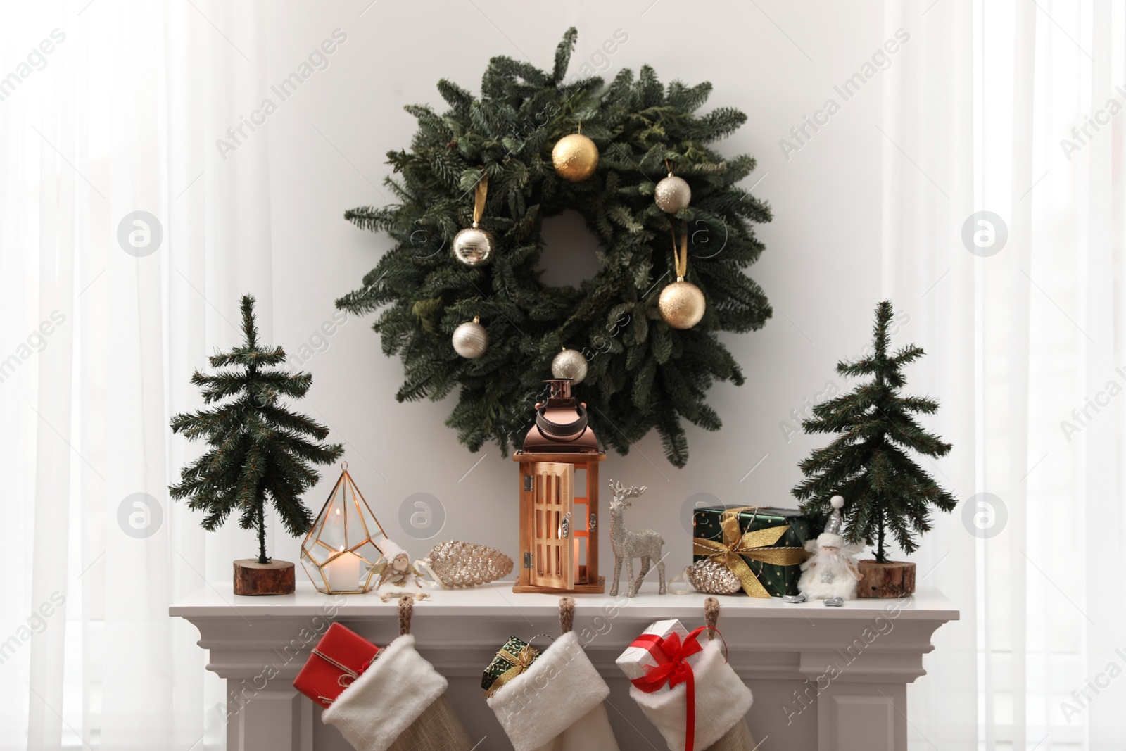 Photo of Different Christmas decorations in room. Interior design