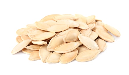 Photo of Pile of raw pumpkin seeds on white background