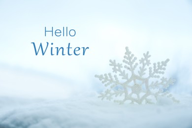 Image of Hello Winter. Beautiful decorative snowflake in white snow