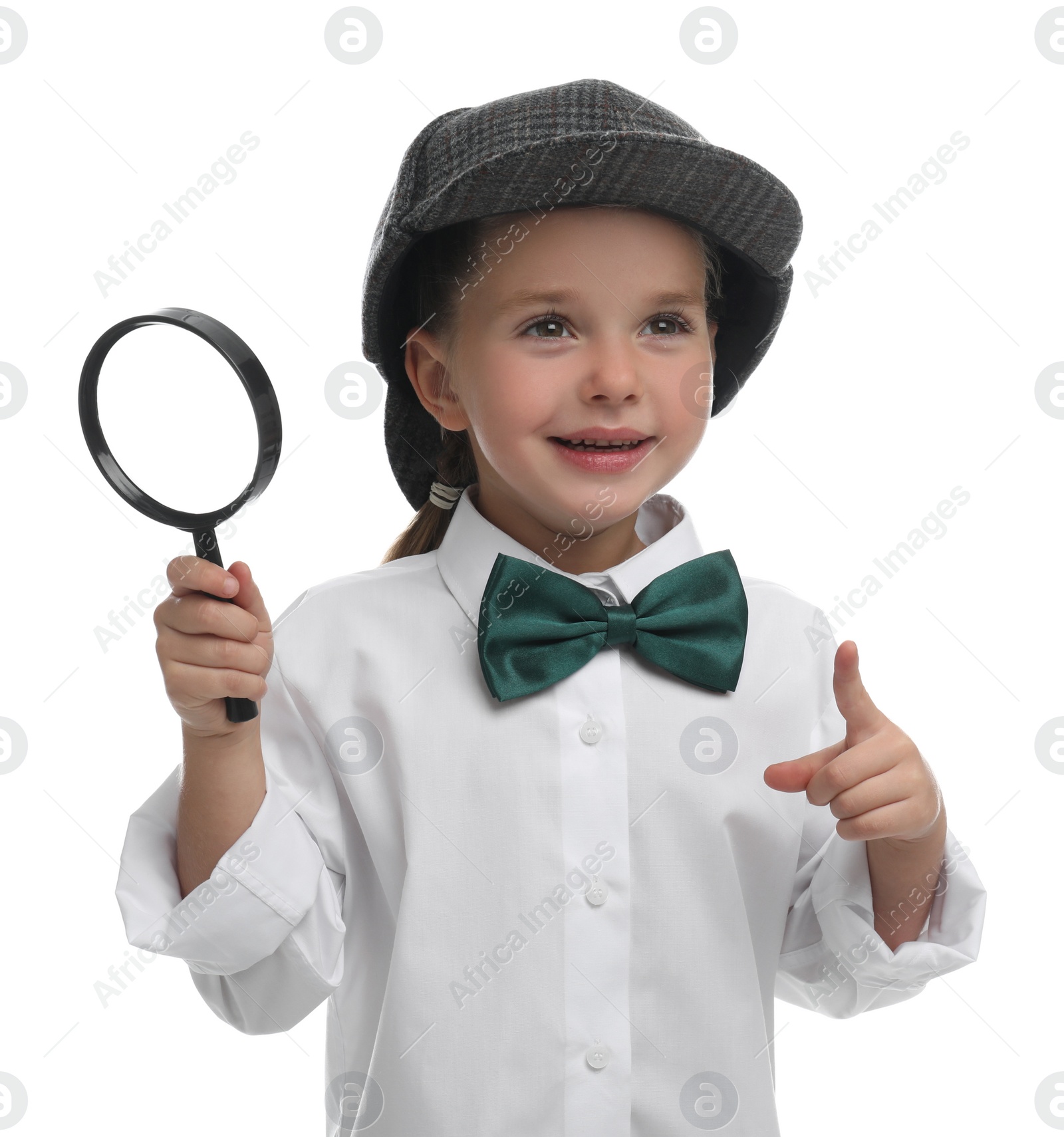 Photo of Cute little detective with magnifying glass on white background