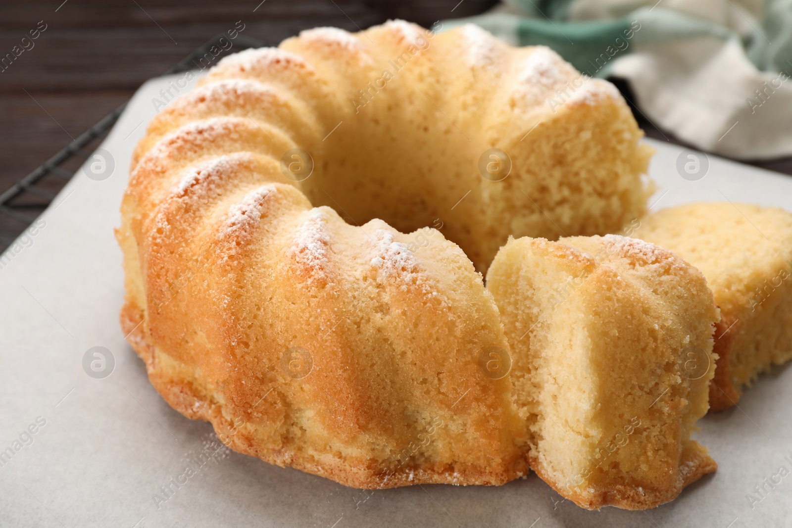 Photo of Delicious freshly baked sponge cake on table, closeup