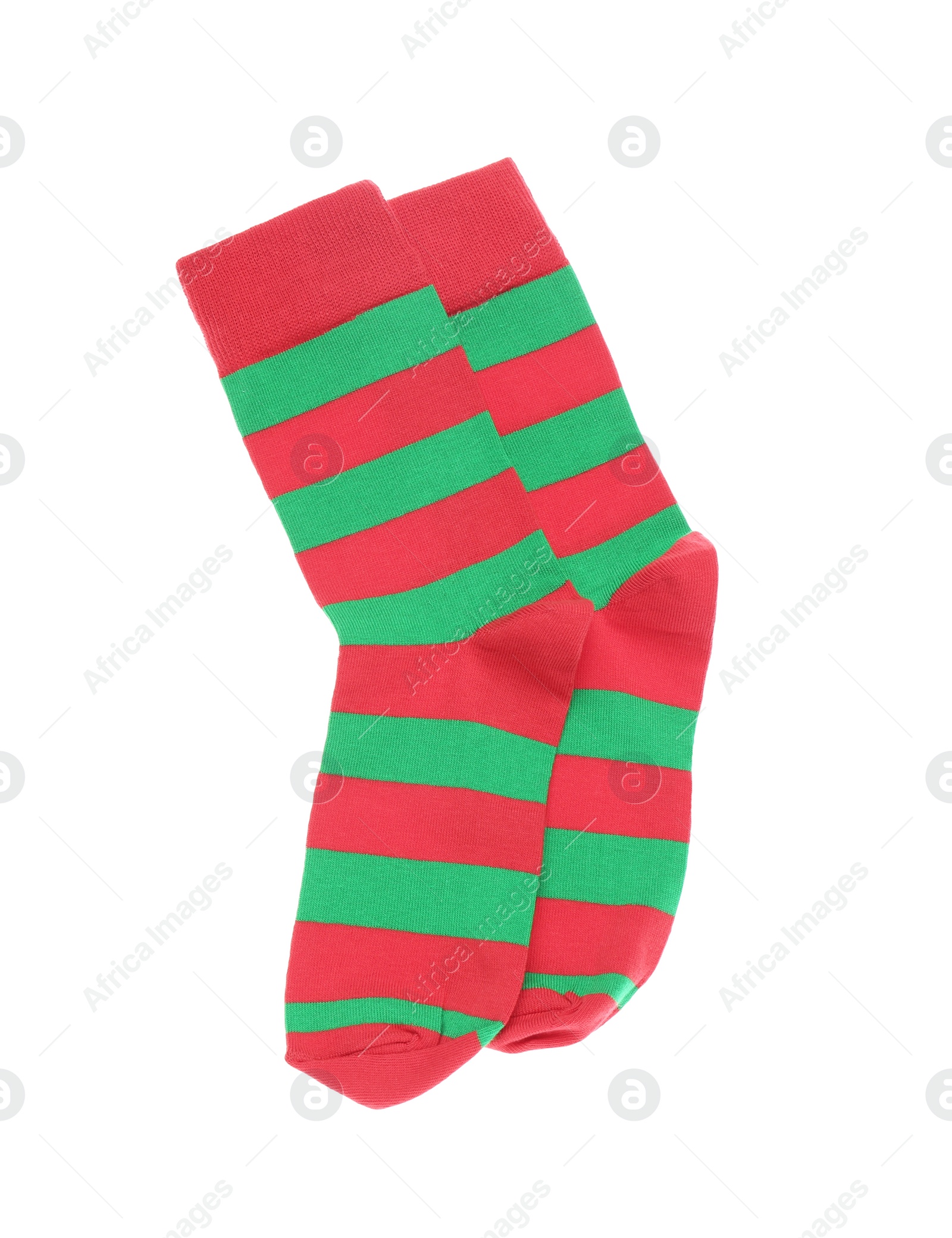 Photo of Red and green striped socks on white background, top view