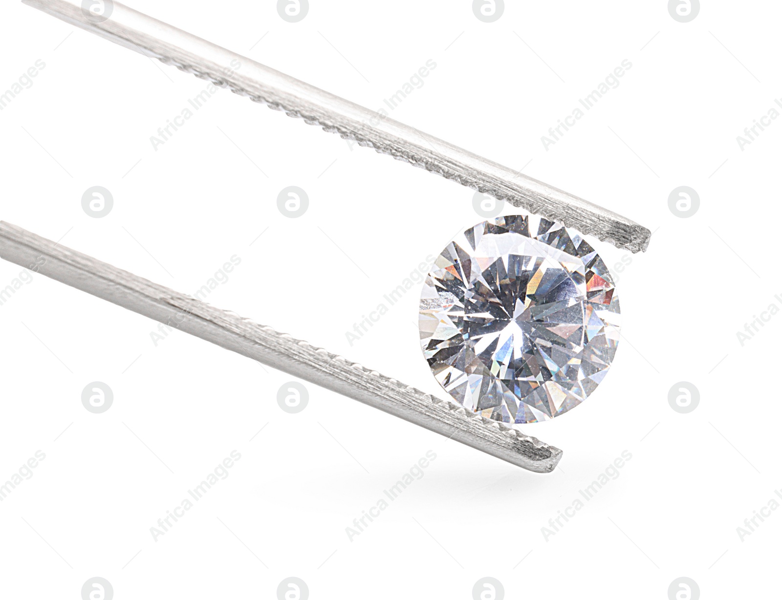 Photo of Tweezers with beautiful shiny diamond isolated on white