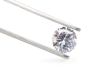 Tweezers with beautiful shiny diamond isolated on white