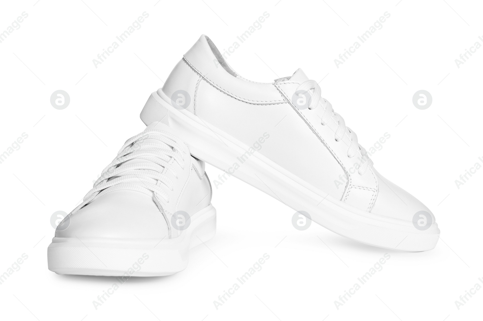 Photo of Pair of stylish sneakers isolated on white