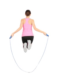 Photo of Sportive woman training with jump rope on white background