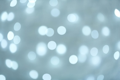 Blurred view of Christmas lights as background. Bokeh effect