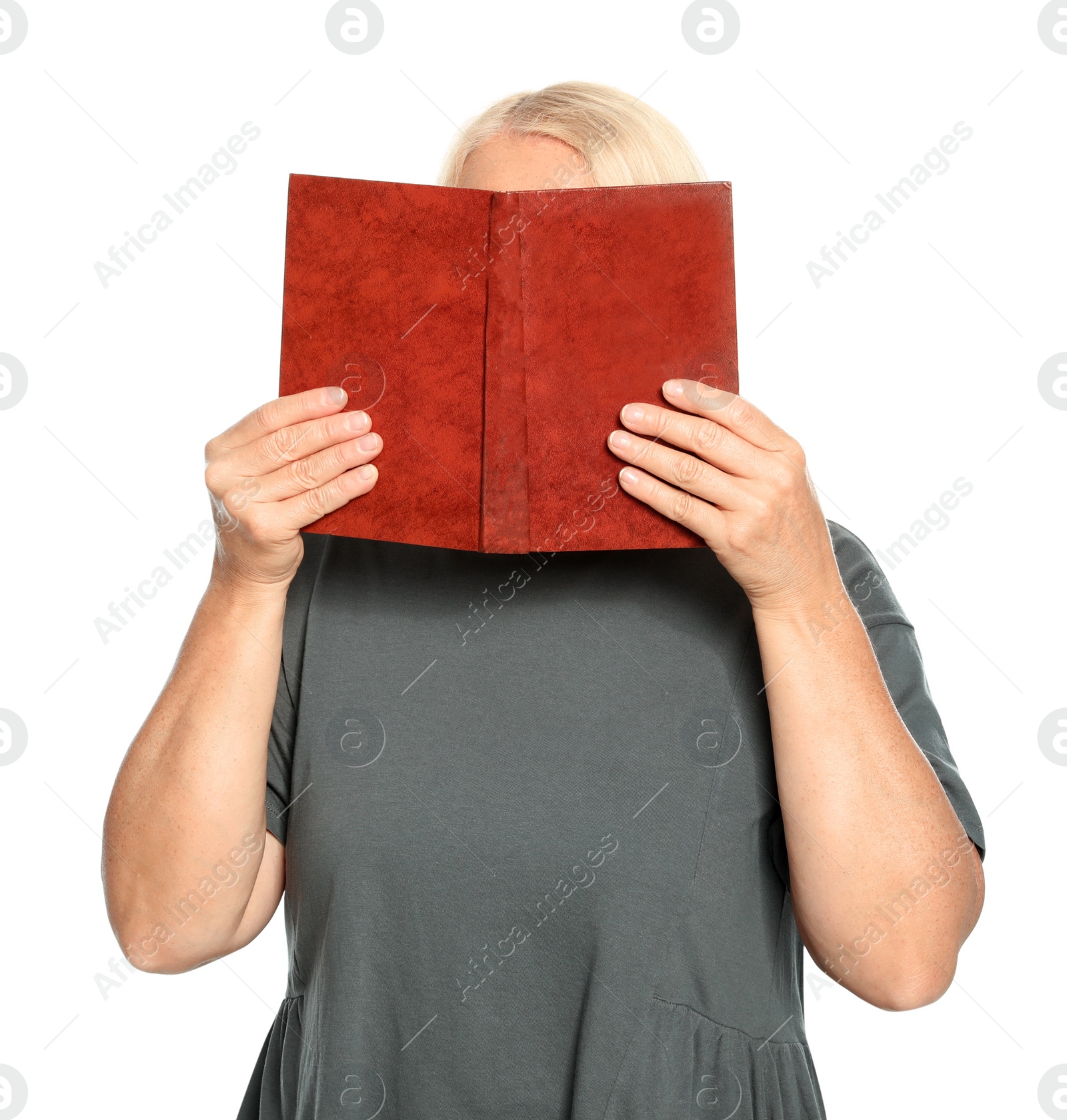 Photo of Mature woman reading book on white background