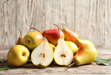 Ripe pears on wooden table. Healthy snack