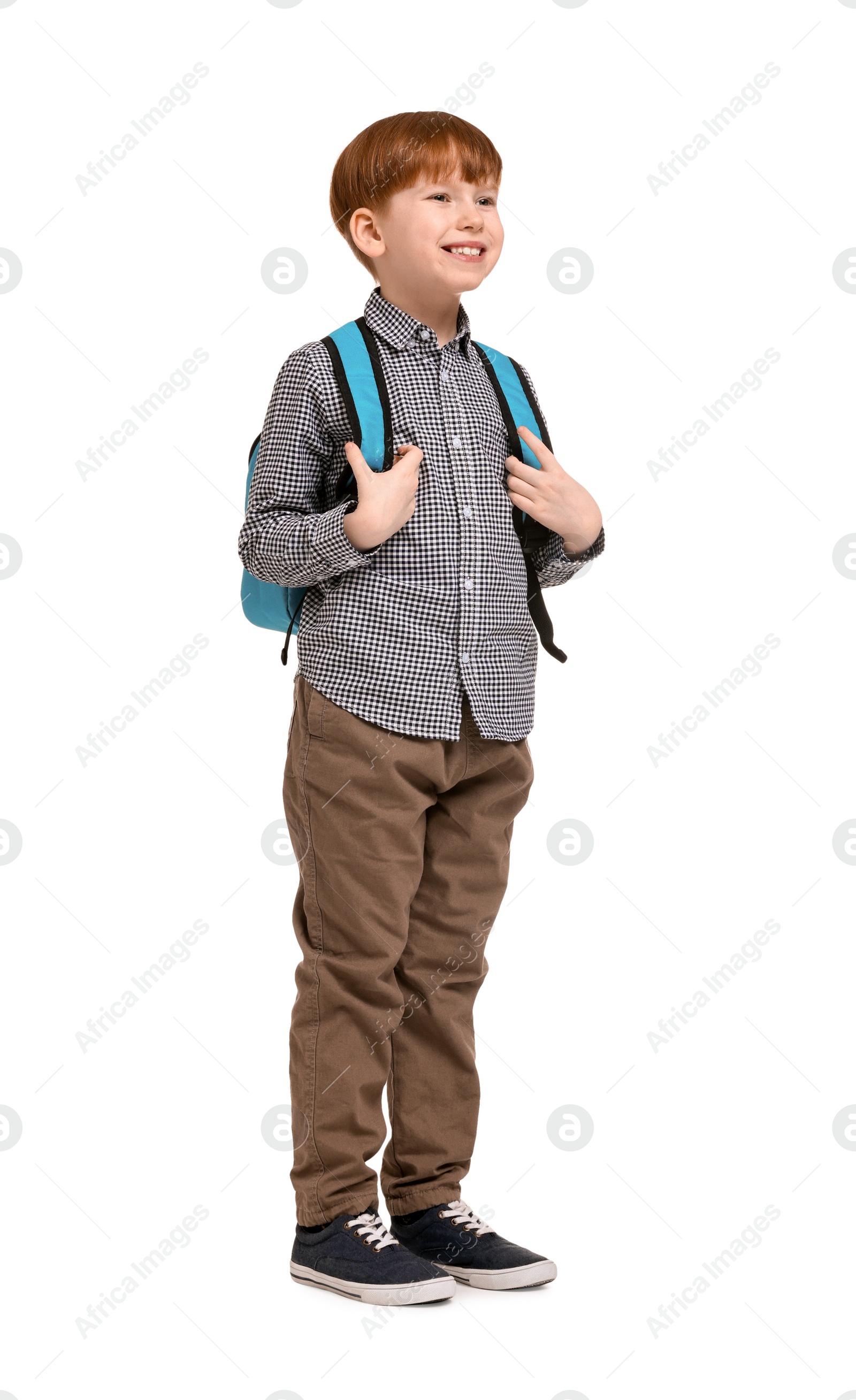 Photo of Little boy with backpack on white background