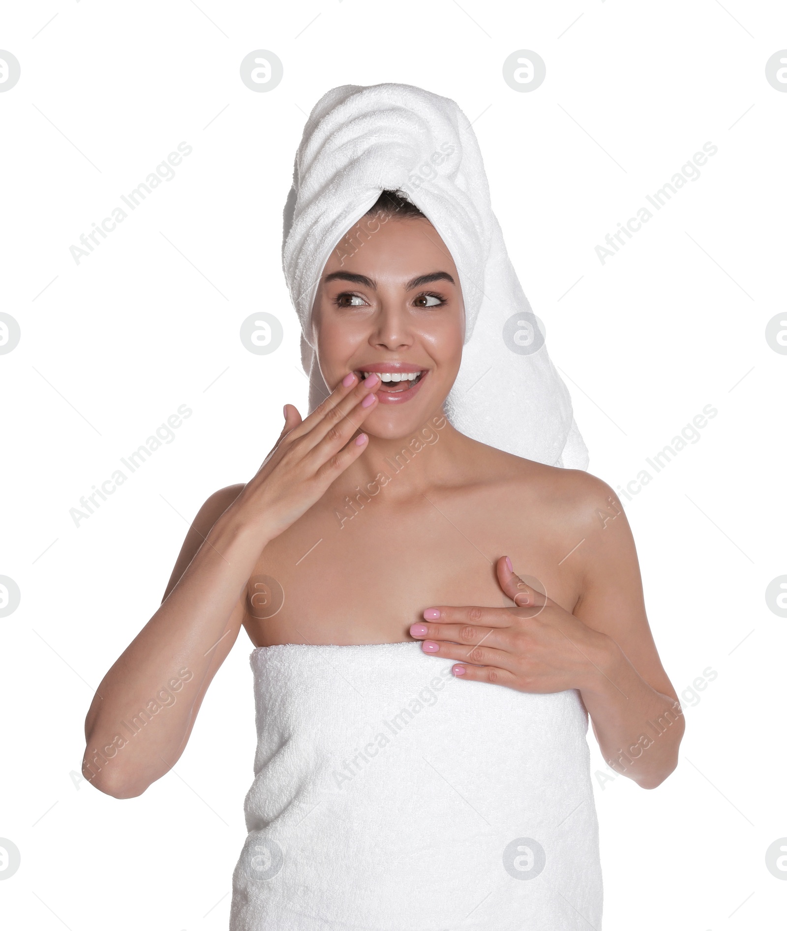 Photo of Beautiful young woman with towels on white background