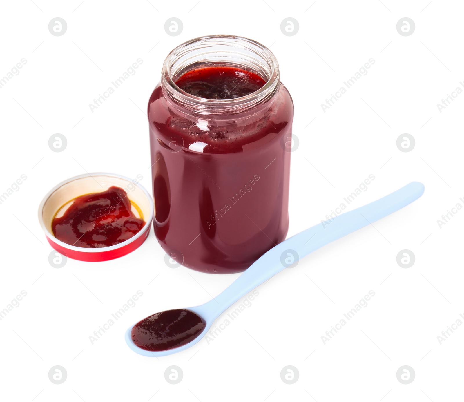 Photo of Tasty baby food in jar and spoon isolated on white