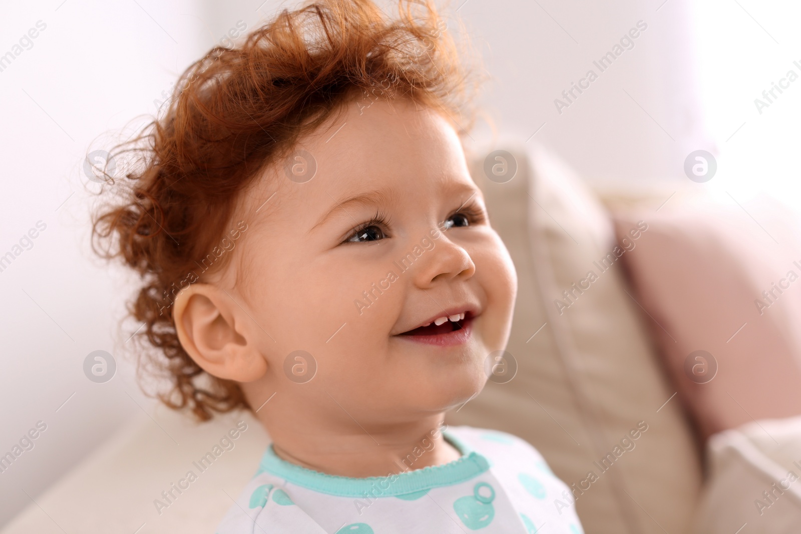 Photo of Portrait of cute little child at home