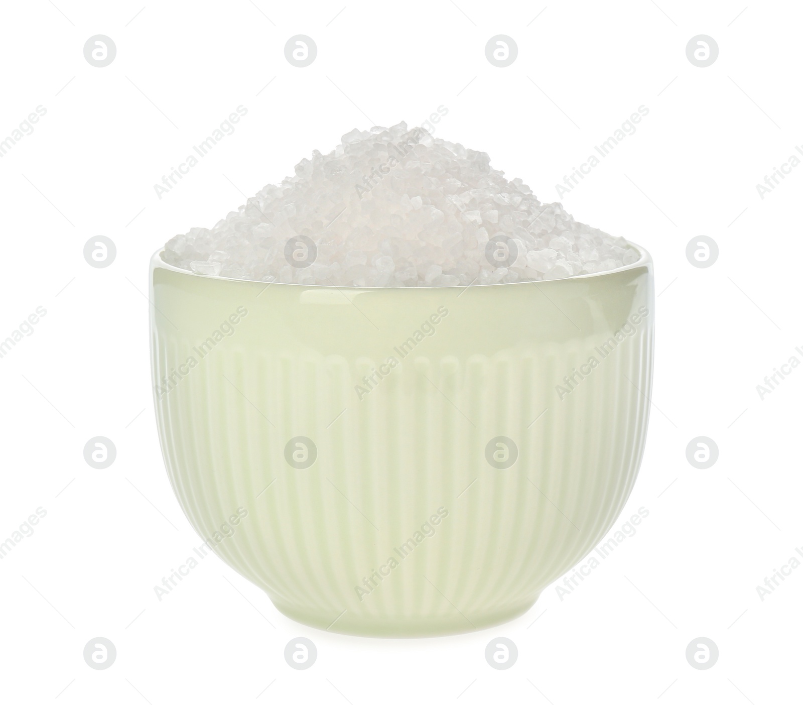 Photo of Bowl with natural salt isolated on white