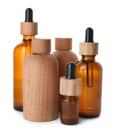 Photo of Different bottles of essential oil on white background
