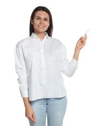 Photo of Beautiful young woman pointing at something with pen on white background. Weather forecast reporter