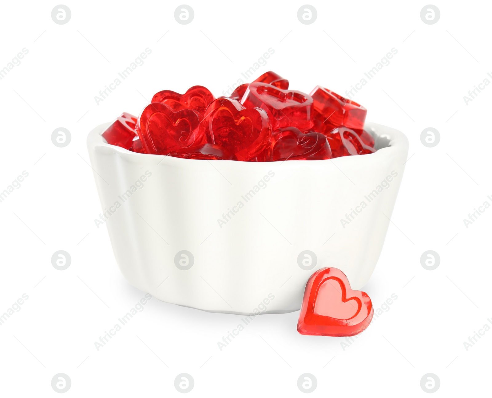 Photo of Sweet heart shaped jelly candies on white background