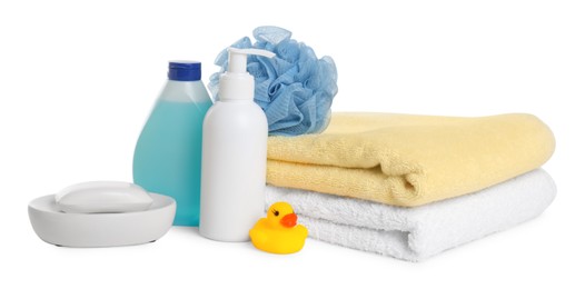 Baby cosmetic products, bath duck, sponge and towels isolated on white