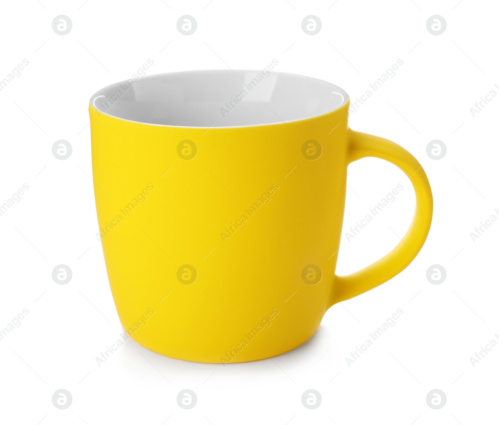 Photo of Yellow ceramic cup isolated on white