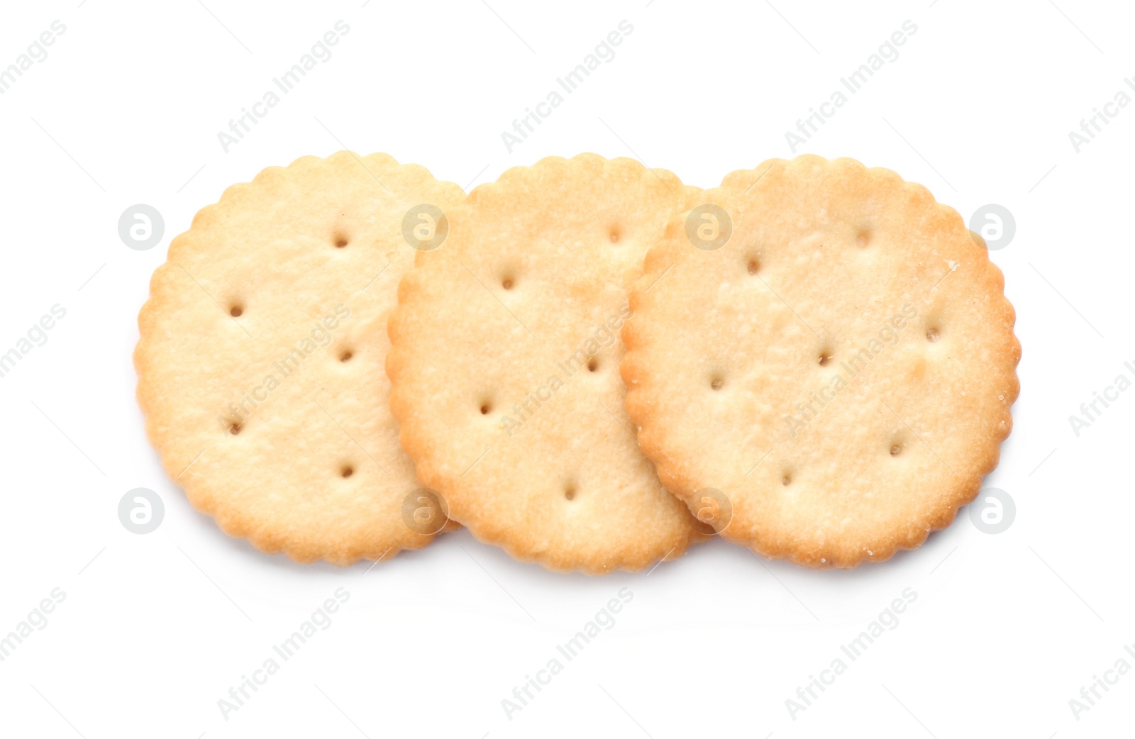 Photo of Delicious crispy crackers isolated on white, top view